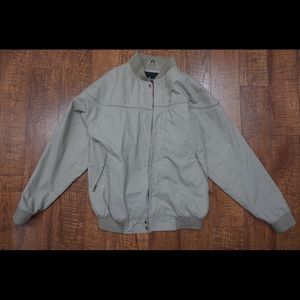 a tan windbreaker jacket
